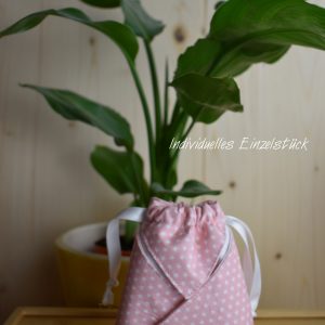 Nachhaltiger Oshin-Beutel als Geschenkverpackung rosa mit Sternchen