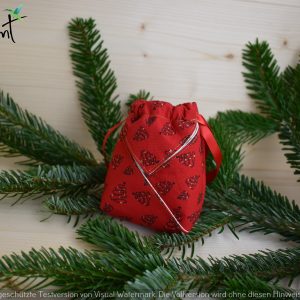 Nachhaltiger MiniOshin-Beutel als Geschenkverpackung und zur Aufbewahrung in farbenfroher japanischer Origami-Technik für Weihnachten in rot
